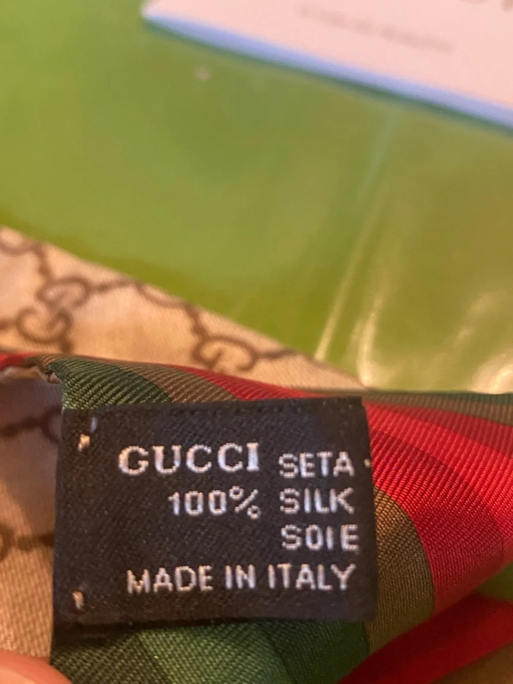 Gucci beige brown GG monogram silk twilly with red trim and gold charm with box